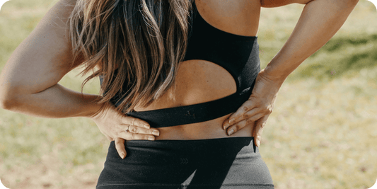 Mal de dos pendant les règles : pourquoi et comment le soulager